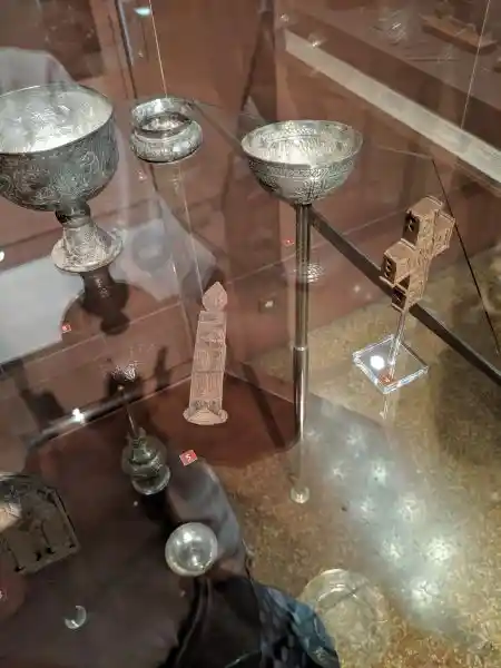 Post-Byzantine silver church vessels and wooden crosses including a chalice and blessing cross
